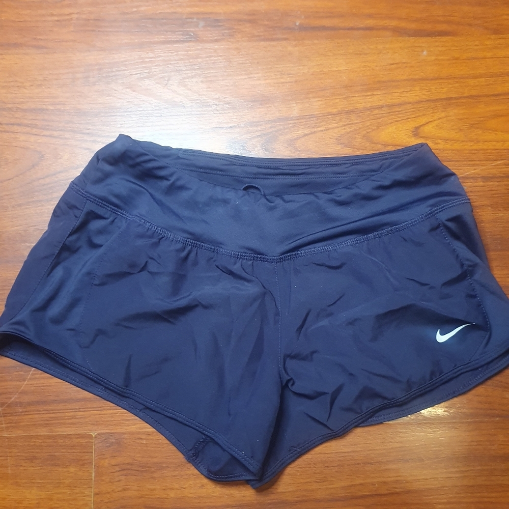 Women’s Nike running dri-fit shorts Plum color sz small